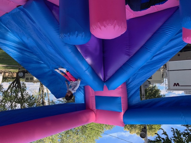 Kids playing on the bounce castle at Rondeau Shores