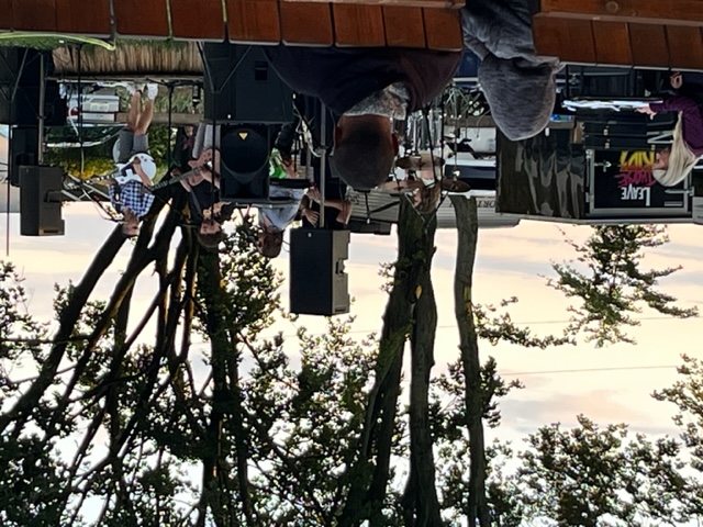 Live band performing at the park at dusk